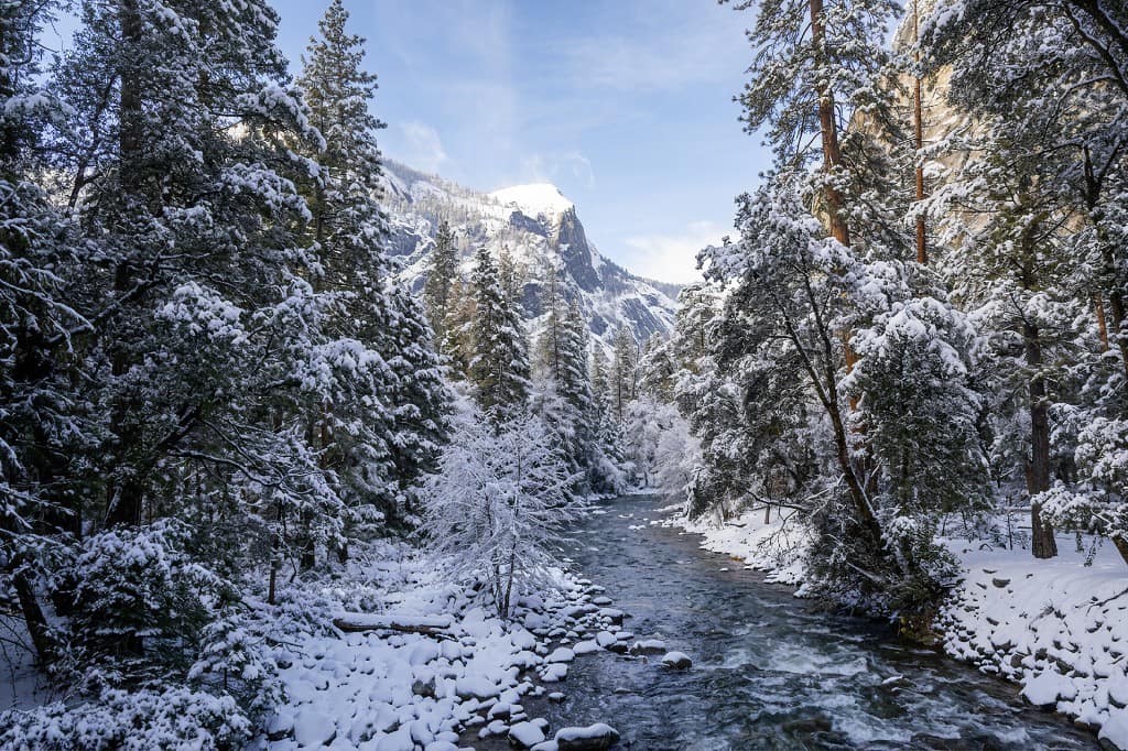 Generated winter river landscape, the full-strength end of a Photoshop Dynamic Layer Add snow slider